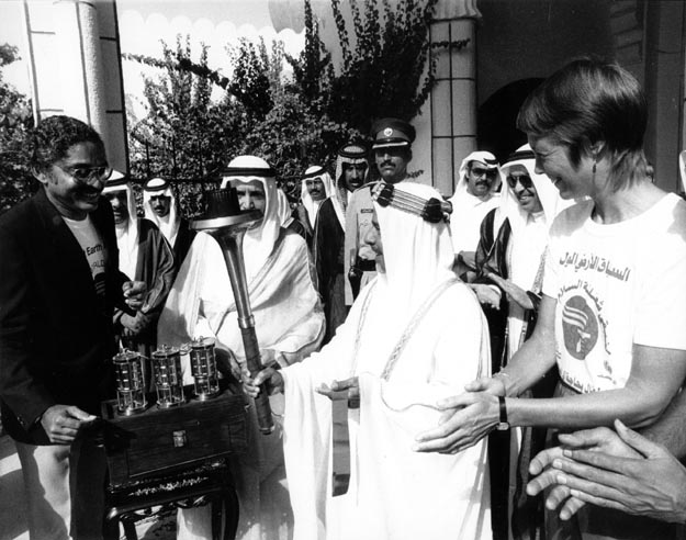 Prince Khalifa bin Salman Al Khalifa lighting the torch with Gail Straub in Bahrain