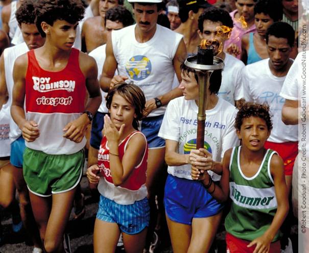 Street kids carry torch. Rio de Janeiro, Brazil