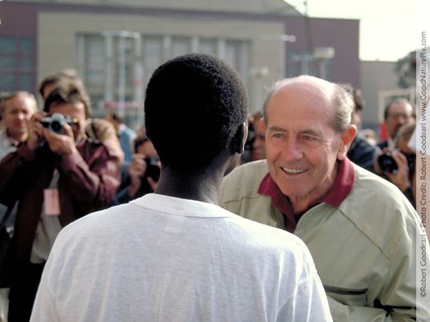 Czechsolvakian Olympic great Emil Zatopek talking with global runner Selina Chirchir. Prague, Czechslovakia