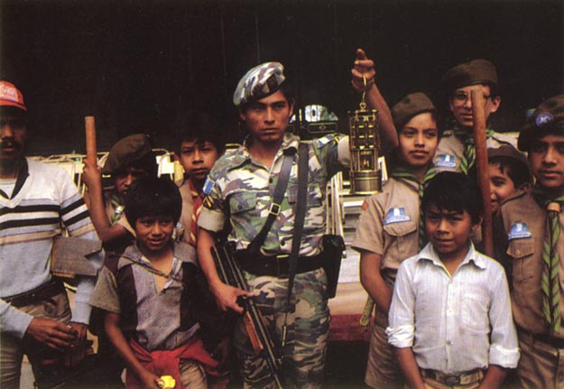 Peace lamp and soldier. Guatemala City, Guatemala