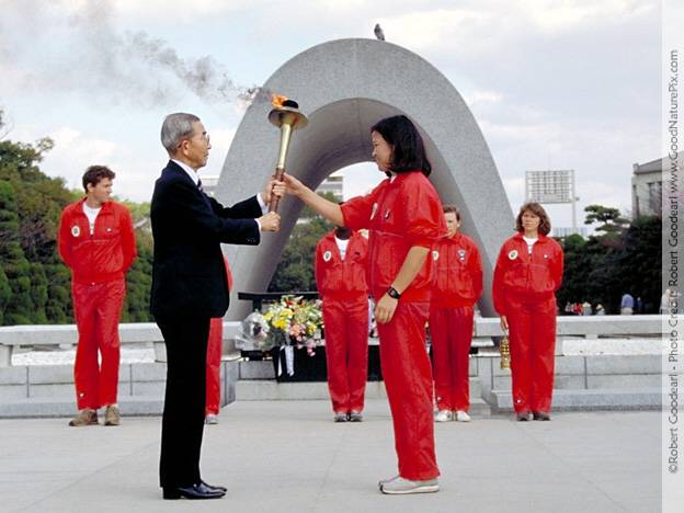 Ceremony at Hiroshima Peace Memorial Park with Governor Takeshita and Mayor Araki. Runners laid a wreath at the Cenotaph for victims of the atomic bomb. Hiroshima, Japan