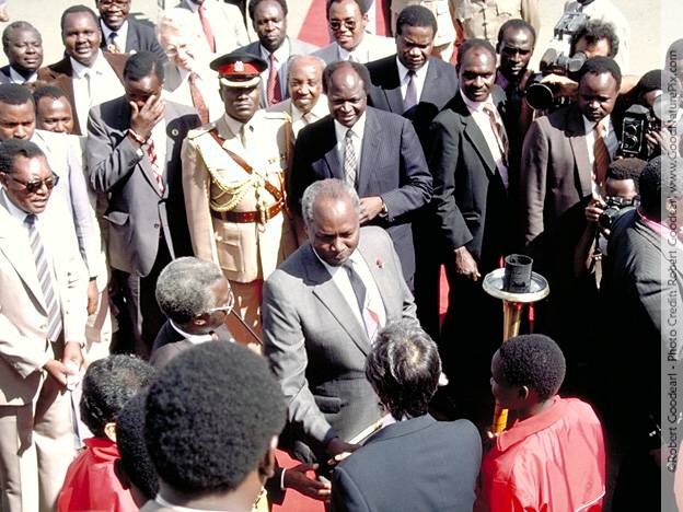 President Daniel Moi receives the torch personally at Nairobi International Airport. Kenya