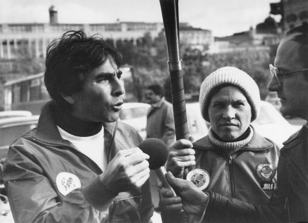 David Gershon and Russian Olympic Runner Lioudmila Bragina interviewed by a reporter. Moscow, Russia